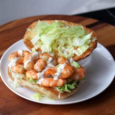  Shrimp Po’Boy: Eine kreole Symphonie zwischen knusprigen Meeresfrüchten und cremigen Saucen!